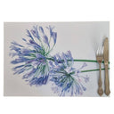 Agapanthus disposable paper placemats in a 25 pack with floral design for spring dining