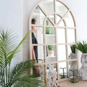 arch mirror in entryway