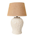 Large ceramic table lamp with glossy off-white leaf-textured base and soft beige shade