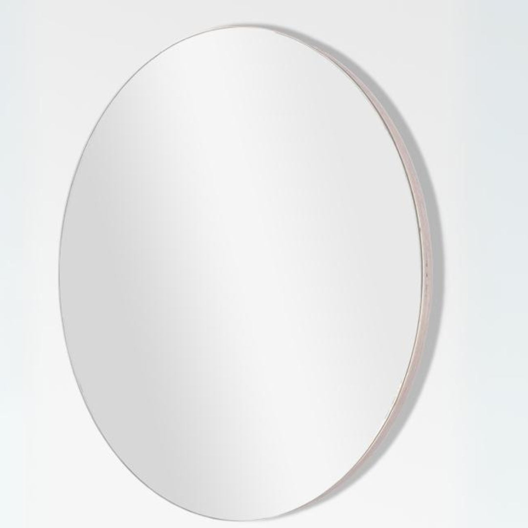 Large decorative round mirror for bedroom or living room, minimalist design.
