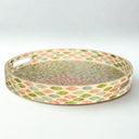 Round capiz serving tray with pastel petal pattern