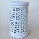 Glossy ceramic plant stand with elegant cut-out details