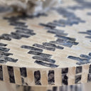 Close up of Capiz shell Side Table handcrafted with care in a black and white finish