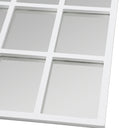 white grid design on the wall mirror