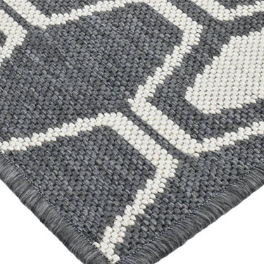 Versatile grey and honeycomb pattern rug for contemporary living spaces