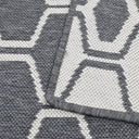 Reversible Connection Grey Rug with stylish honeycomb pattern, enhancing modern decor.
