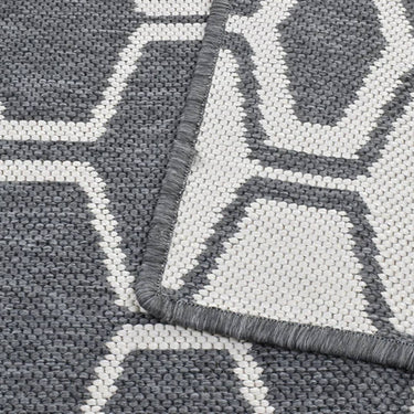 Reversible Connection Grey Rug with stylish honeycomb pattern, enhancing modern decor.