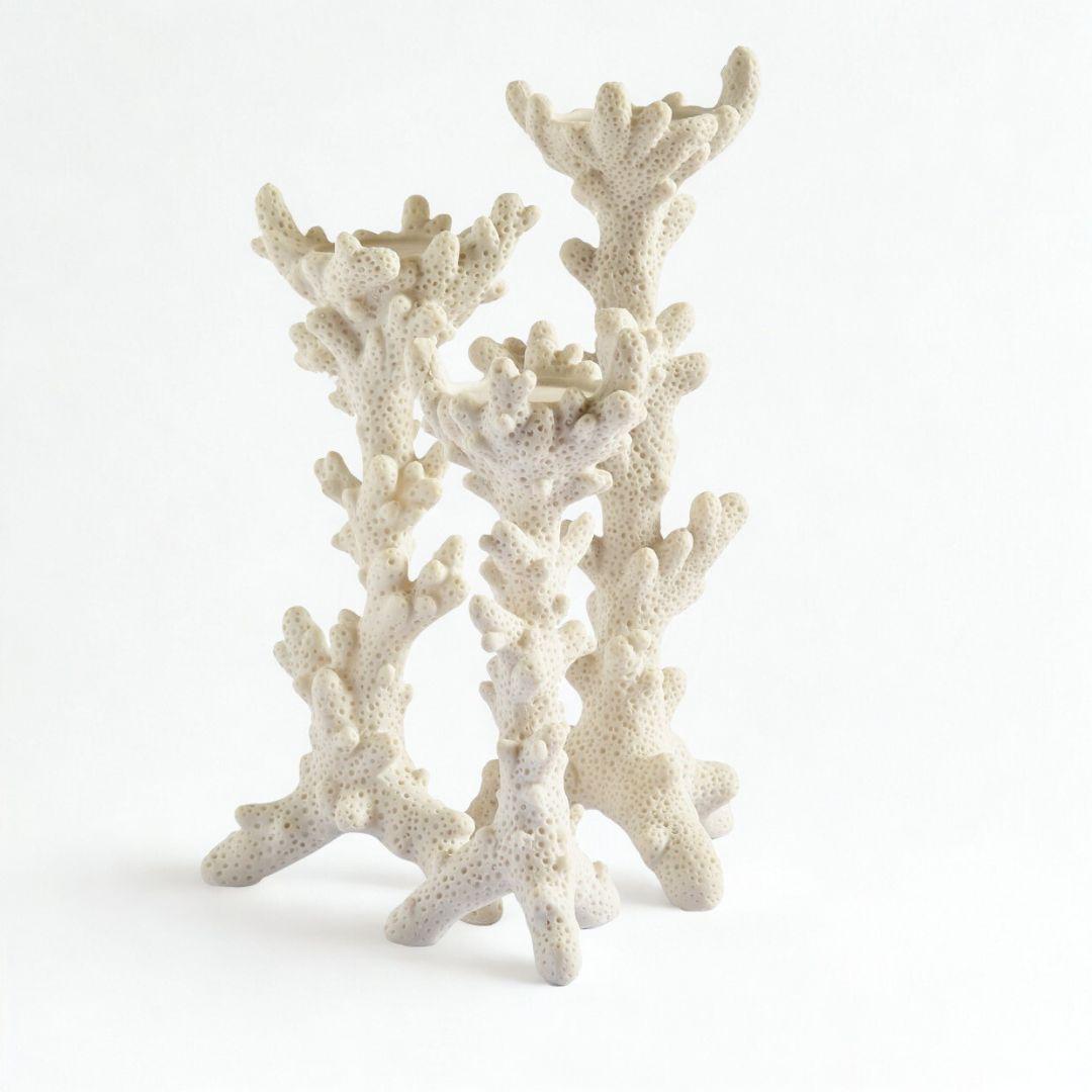 Decorative white candle holders with round bases and coral-inspired sculptural detailing, fits tealights