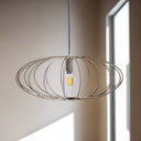 Eclipse wire pendant light hanging in living room