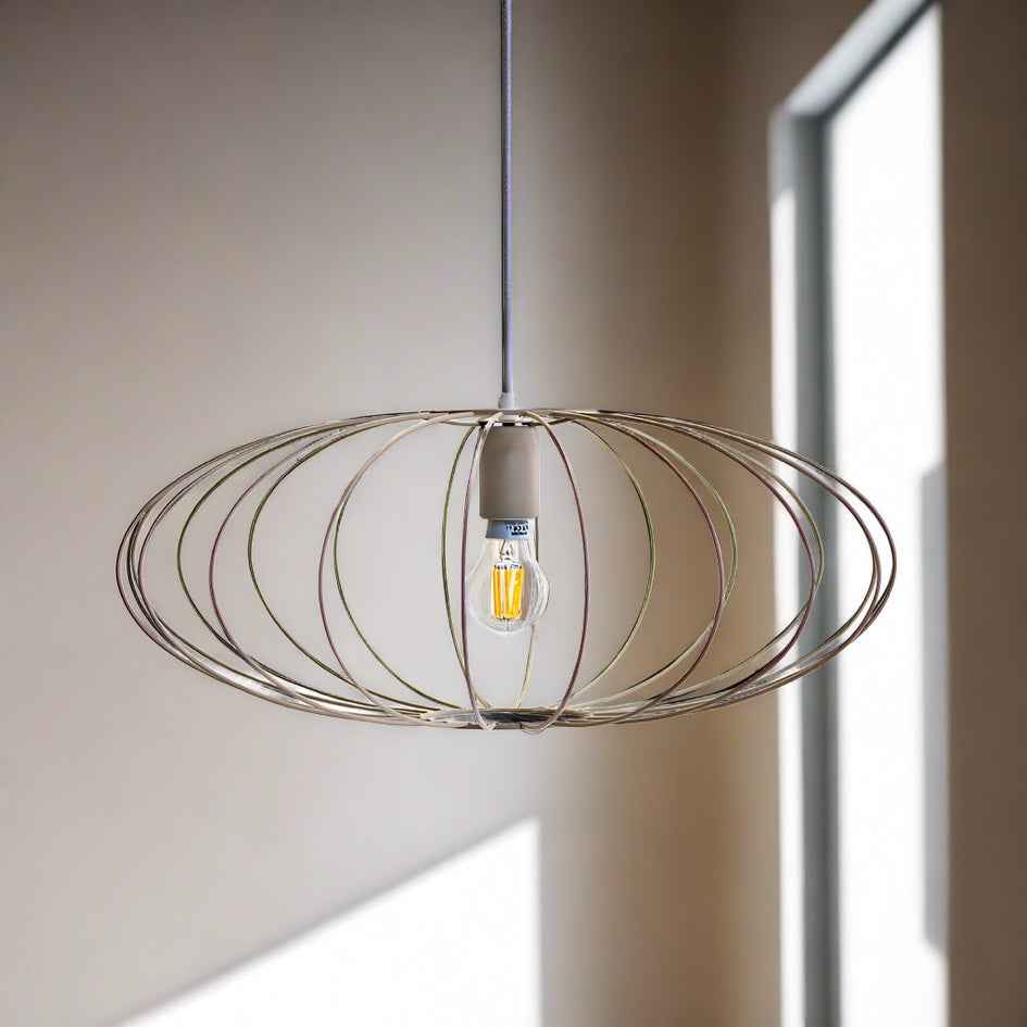 Eclipse wire pendant light hanging in living room