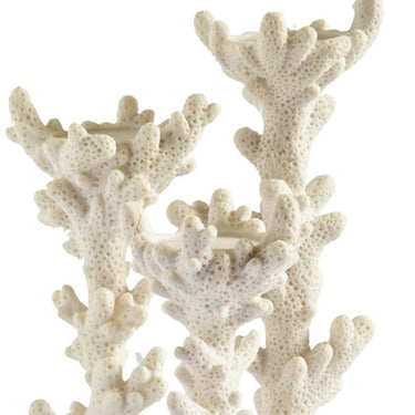 Set of three white candle holders with flowing, detailed coral design