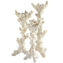 White candle holders in varying sizes with intricate coral-like detailing, perfect for tabletop décor.