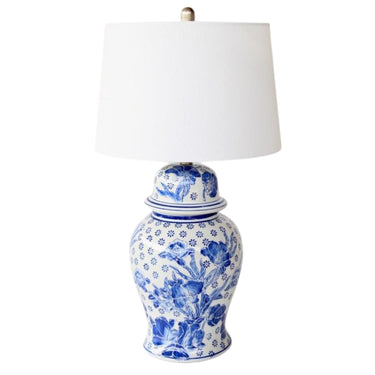 Blue floral ginger jar lamp with off-white ceramic base and white finial & harp shade
