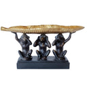 decorative tray held by black resin monkeys with gold leaf finish