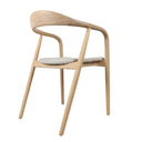 Dining Chair in natural ash wood frame and contoured backrest.