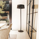 Heatwave Patio Heater in Ash with glass heating element and olefin mesh cover, set up on a modern outdoor patio
