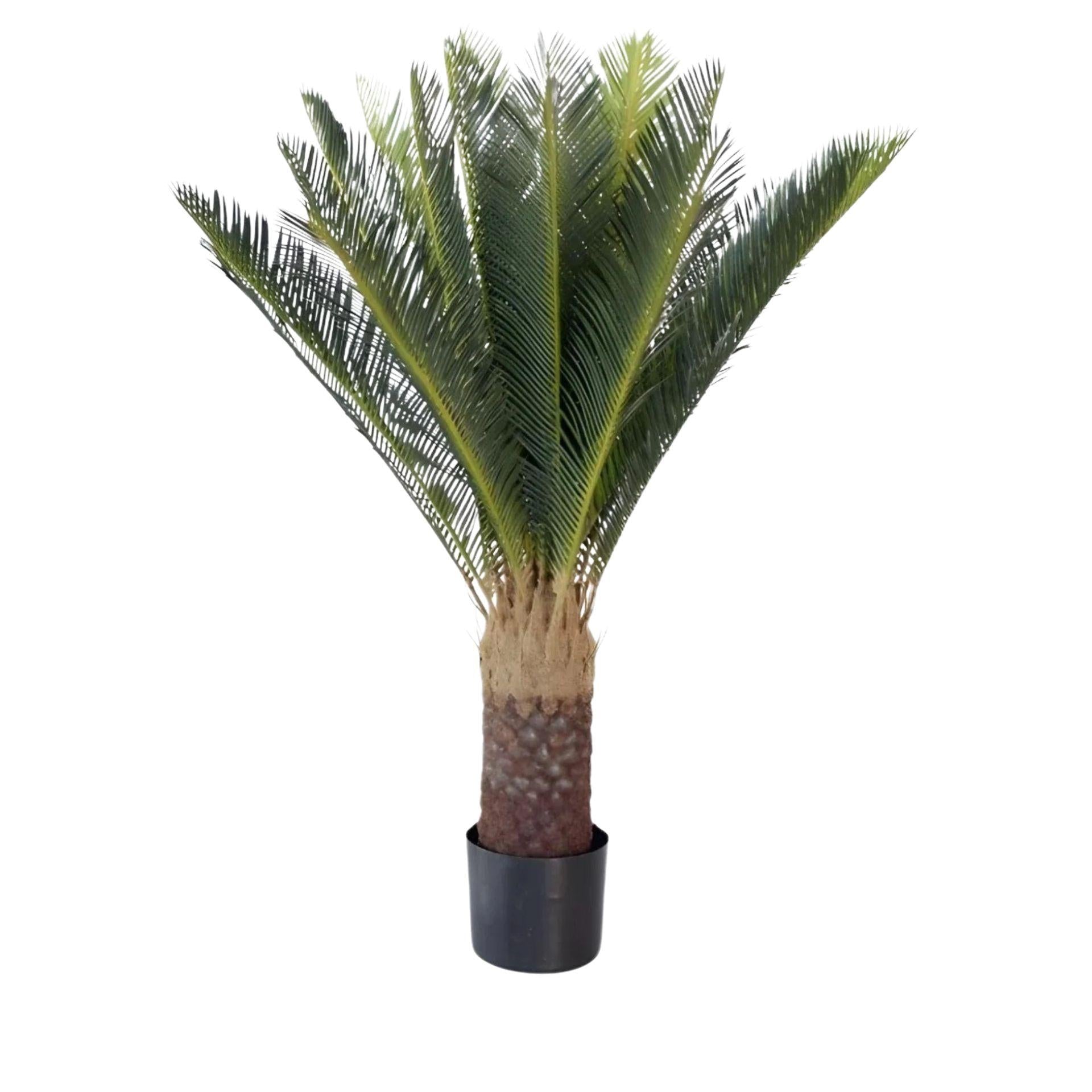 Realistic large faux cycad plant with textured trunk and lifelike fern-style leaves in a modern pot