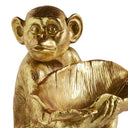 Large monkey bowl in gold resin, adding a playful touch to your home décor.