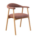 A upholstered dining chair with solid oak legs and a cushioned seat.