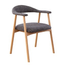 Oak dining chair upholstered with a Sikara fabric cushioned seat.