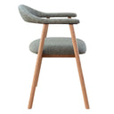 dining chair in solid oak backrest, an angled oak frame, and plush upholstery in Sikara fabric
