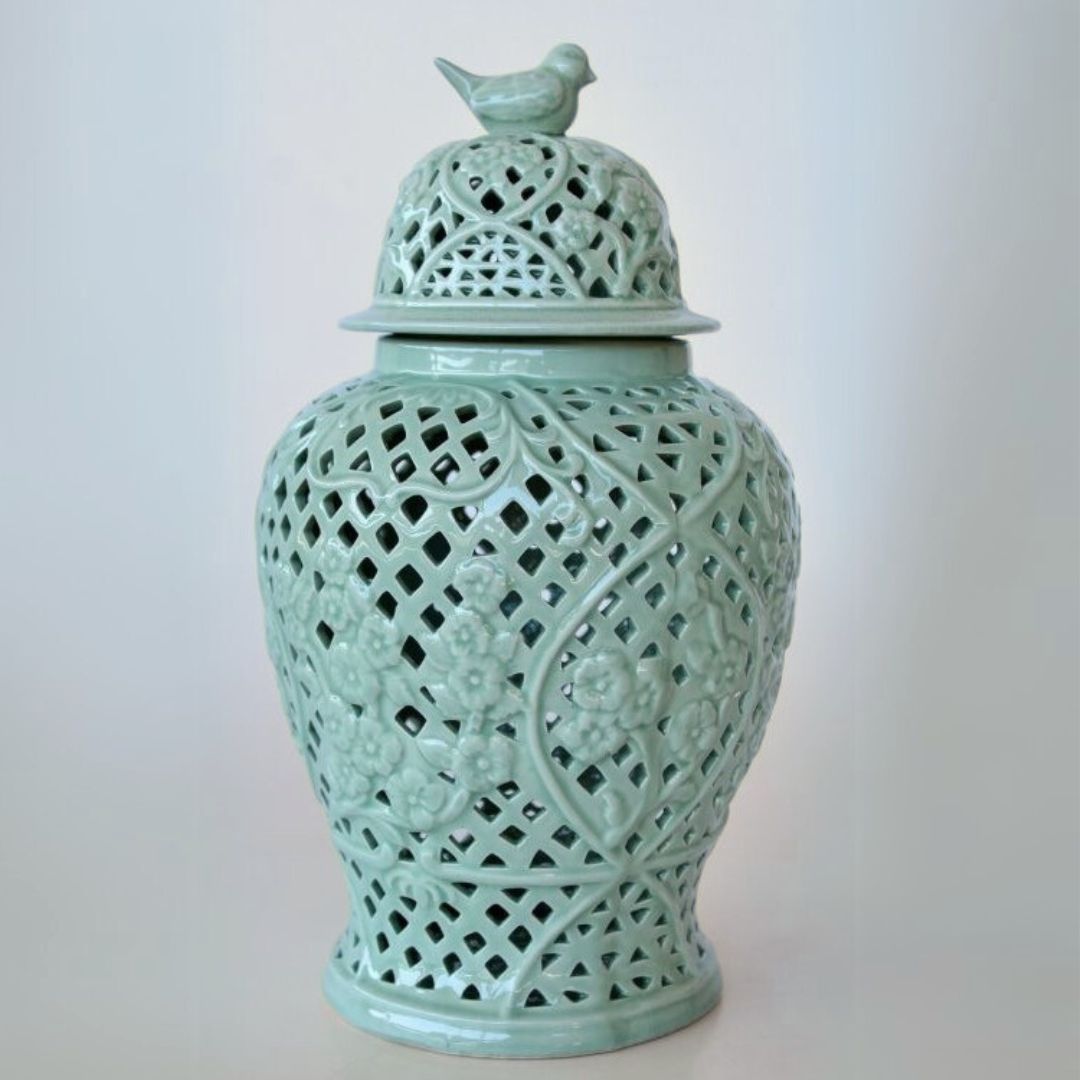 Elegant ceramic ginger jar in soft green.