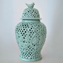 Elegant ceramic ginger jar in soft green.