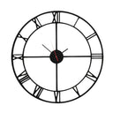 Roman Numeral Clock in black with cut-out numerals. Woodka Interiors South Africa.