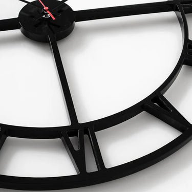 Roman Numeral Clock with a black frame and Roman numerals.