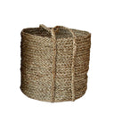 Handwoven seagrass basket for storage.