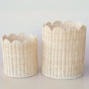 Set of 2 handwoven rattan baskets with scalloped edge finish for home organization.