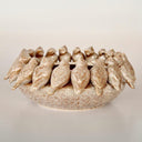 Handcrafted ceramic centerpiece with bird details