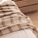 Tatter-tale throw in tawny