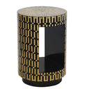 Mother of pearl side table with central sculptural cutout and polished finish. A compact and unique side table for luxury interiors.