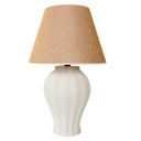 A stylish ceramic weave table lamp featuring a large off-white ceramic weave design base and a beige shade, perfect for a modern living space.