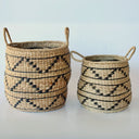 Decorative woven baskets with an organic silhouette and zigzag pattern.