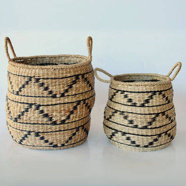 Decorative woven baskets with an organic silhouette and zigzag pattern.