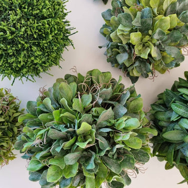 artficial greenery balls and plants