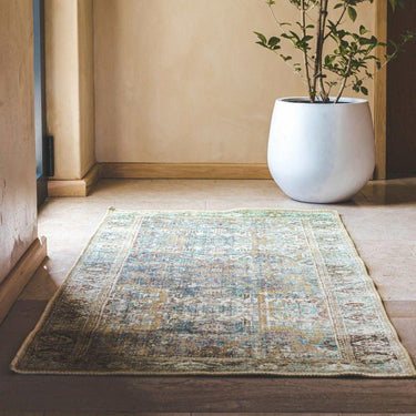 Modern hydro blue rug runner styled in a bright hallway