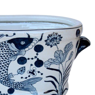 close up of the Aura Oval Planter featuring oval shape and hand-painted koi motif