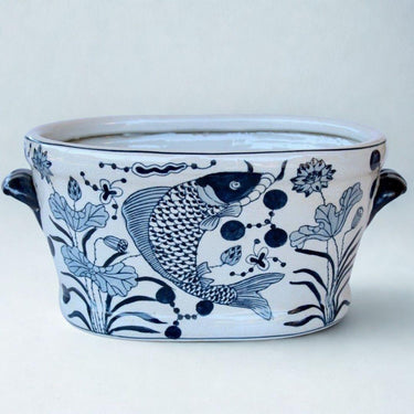 Aura Oval Planter featuring oval shape and hand-painted koi motif