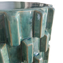 close up of the Handcrafted Celadon Ceramic Side Table with modern sculptural silhouette for indoor and outdoor use