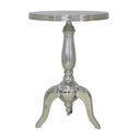 Traditional round metal side table with polished finish