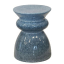 Blue speckled side table on a white background