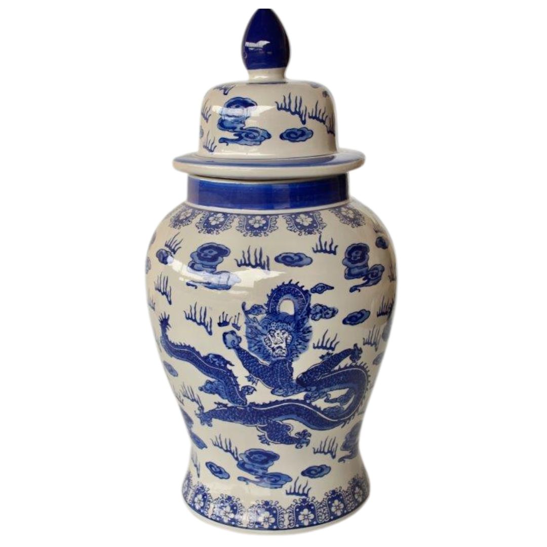 A ceramic ginger jar with a blue and white dragon pattern and a lid with a handle on top.