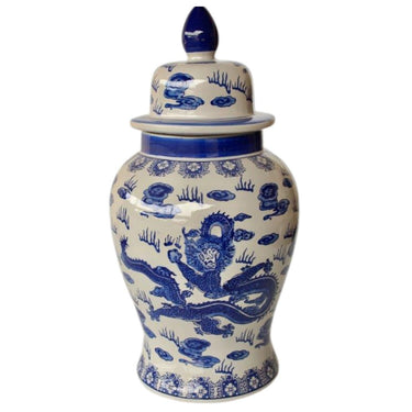 A ceramic ginger jar with a blue and white dragon pattern and a lid with a handle on top.
