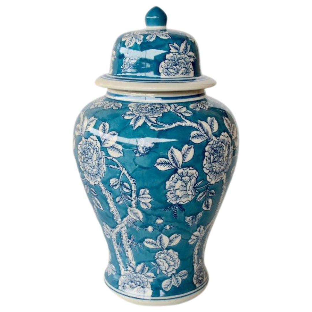 A blue and white floral ginger jar with a lid.
