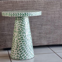 roun top Side table made from bamboo and green capiz shell detailing styled