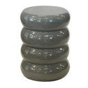 Gray cylindrical side table with stacked ring design on a white background