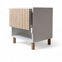 White nightstand with fluted natural birch drawer and open shelf. Minimalist storage nightstand with clean lines and contrast